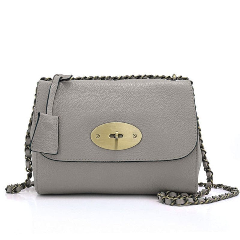 sac à bandoulière rigide gris fermeture laiton
