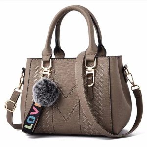 sac à main sangle ajustable pompon